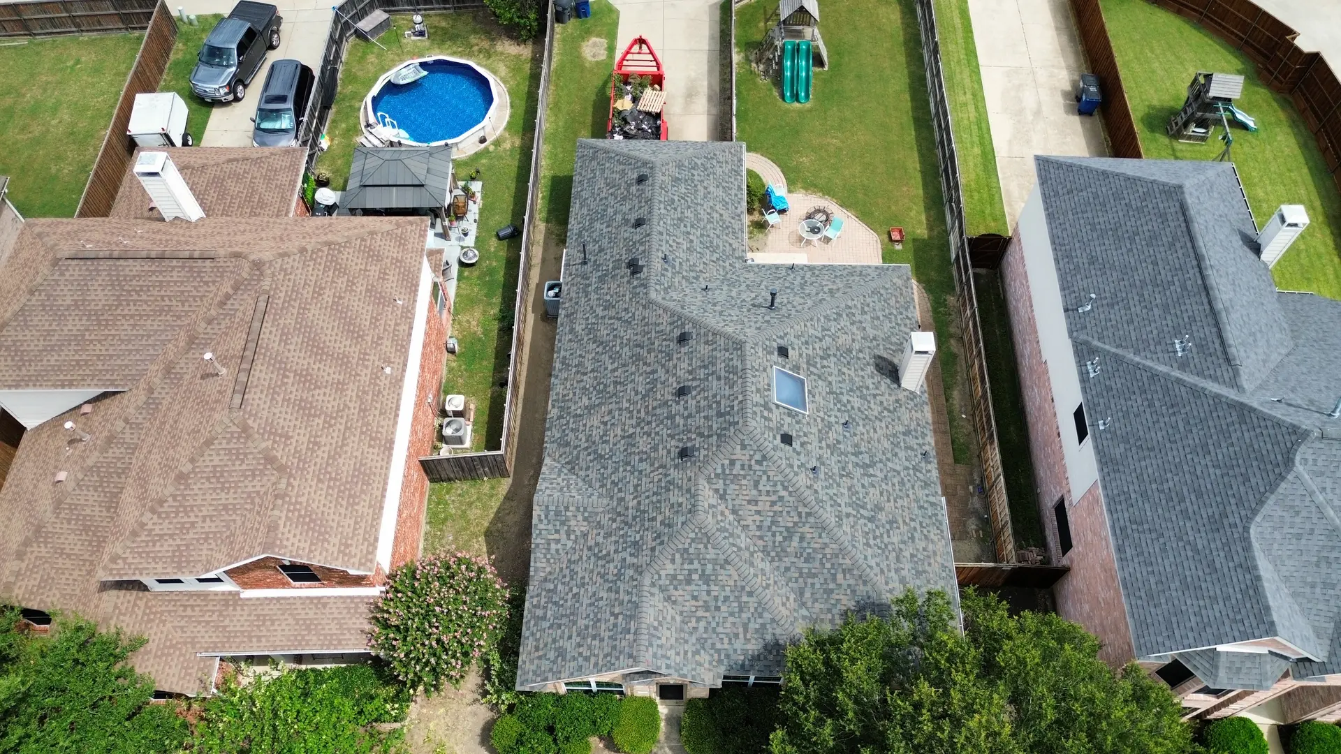 Drone view of a residential roof replacement in a North Texas neighborhood